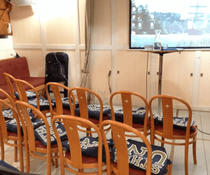 1inför ett seminarium på Briggen